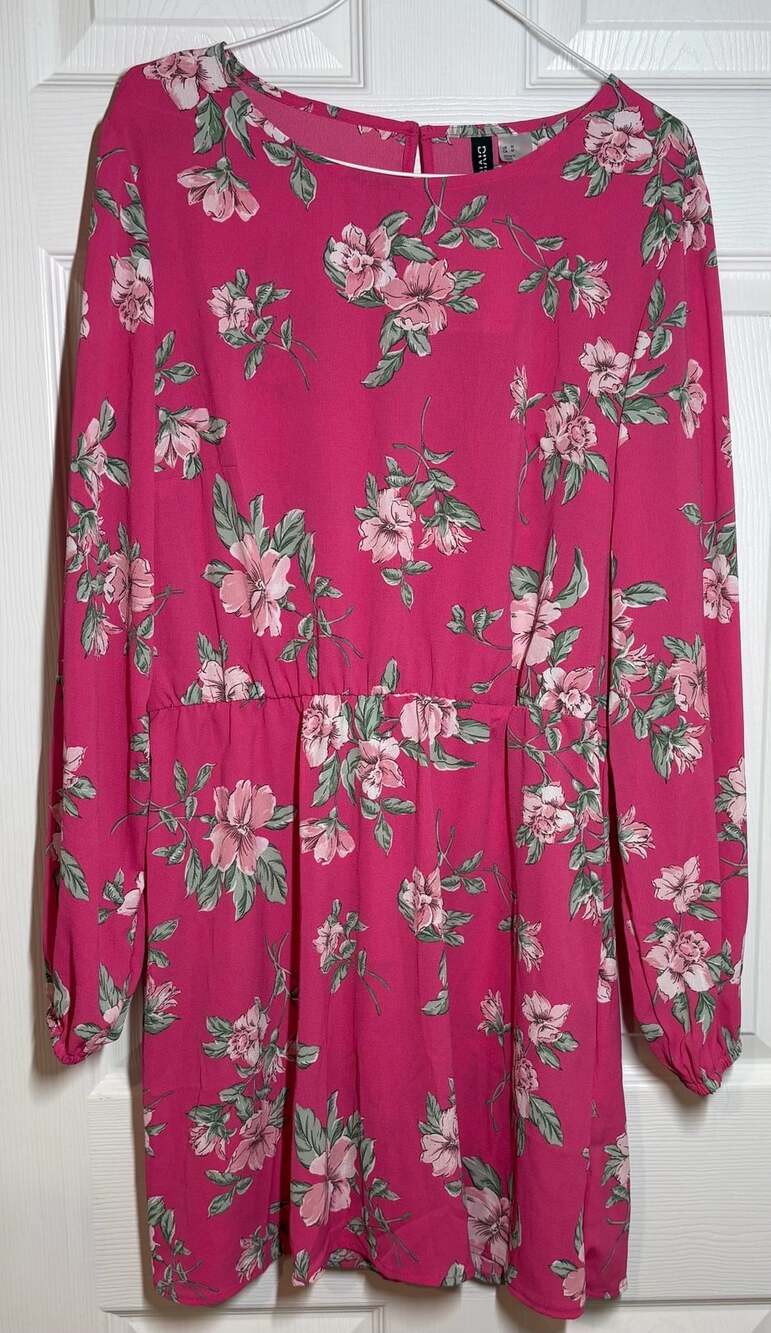 long sleeve mini dress in a pink floral print. Medium